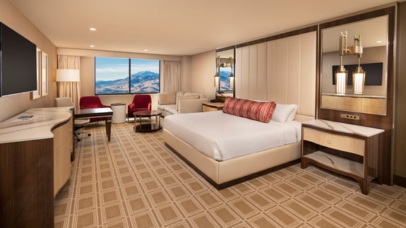 1_PHOTO_Concierge-Deluxe-King-Room-hero-view-of-bedroom_01_q085_1920x1080