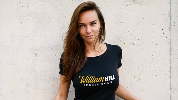 Lady wearing William Hill Tshirt
